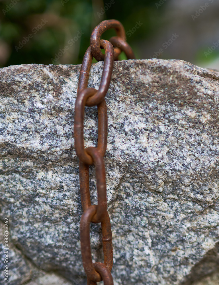 steel rusty chain on a beautiful background steel rusty chain on a beautiful background