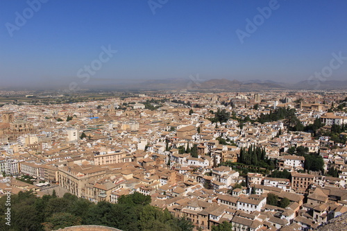 Aerial view of the Albaicin city taken from Watch Tower (Torre de la Vela) of the historical Alhambra Palace complex in Granada, Andalusia, Spain.
