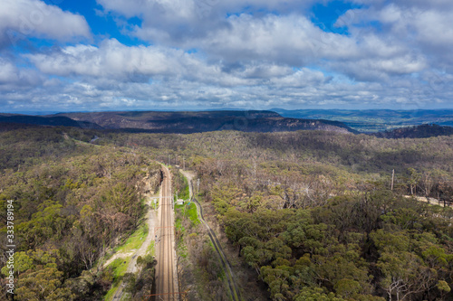 Fototapeta Naklejka Na Ścianę i Meble -  A regional railway line running through The Blue Mountains in Australia