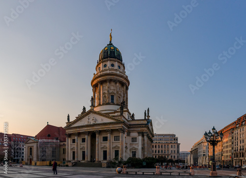 French Cathedral located at the Gendarmenmarkt at the Corona crisis - A lonely man © Mummert-und-Ibold