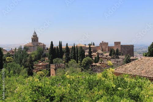 Historical Alhambra palace and fortress complex taken from Generalife gardens in Granada, Andalusia, Spain. photo