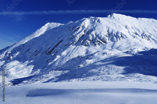 Winter alpine landscape in National Park Retezat, Carpathians, Romania, Europe