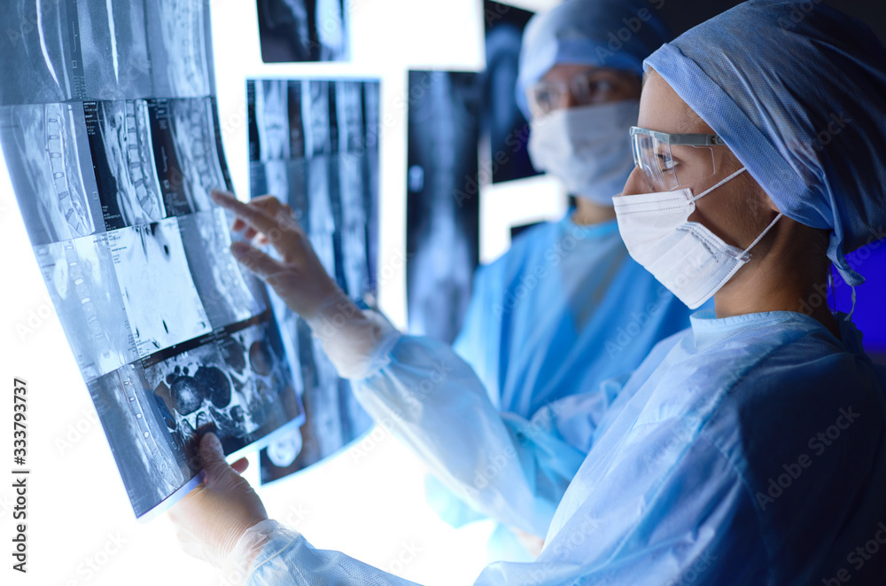 Doctors Analyzing An X ray In A Meting Stock Photo Adobe Stock