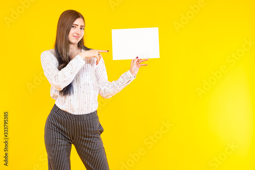 Girl points to a blank shee...