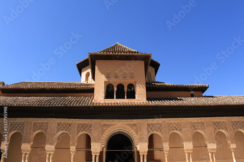 Palace of the Lions, a part of Nasrid Palaces (Palacios Nazaries) at the historical Alhambra Palace and fortress complex in Granada, Andalusia, Spain.