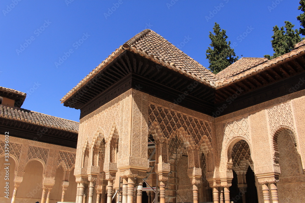 Palace of the Lions, a part of Nasrid Palaces (Palacios Nazaries) at the historical Alhambra Palace and fortress complex in Granada, Andalusia, Spain.