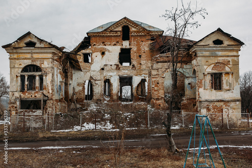 Fototapeta Old ruined abandoned mansion