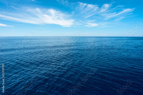 nobody in blue sea with horizon under blue sky in Greece