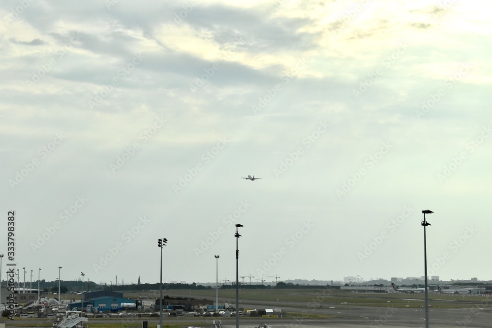 A flight is just take off and rising to the sky A flight is just take off and rising to the sky
