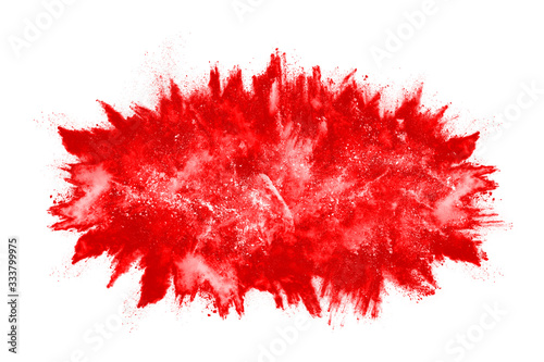 Freeze motion of red powder exploding, isolated on white background. Abstract design of red dust cloud. Particles explosion screen saver, wallpaper © kitsana