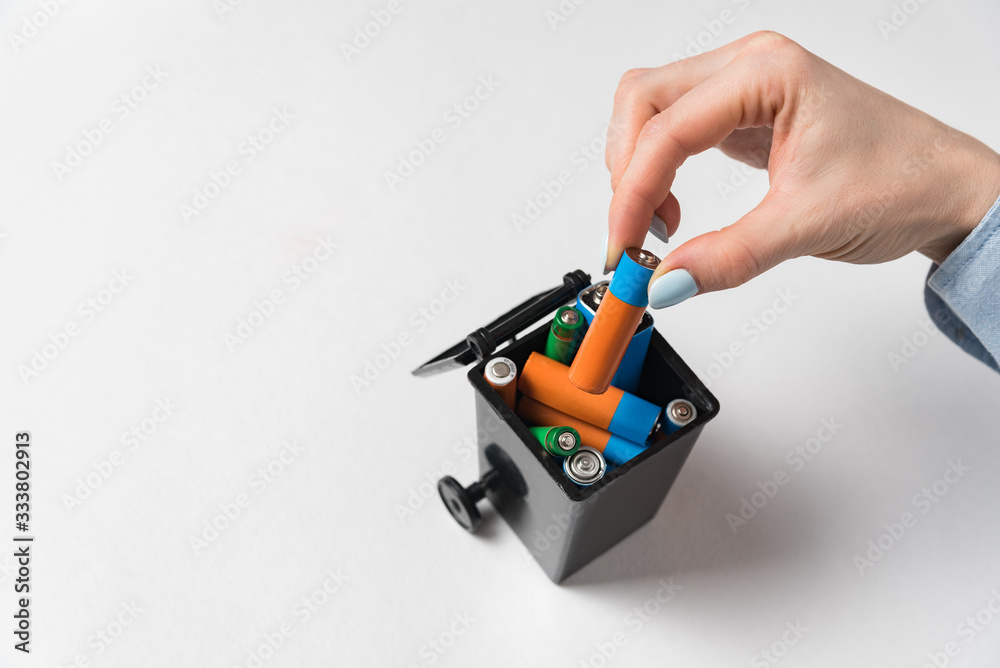 Environmental pollution from old battery. Ecological recycling used batteries concept. Environmental pollution from old battery. Ecological recycling used batteries concept.