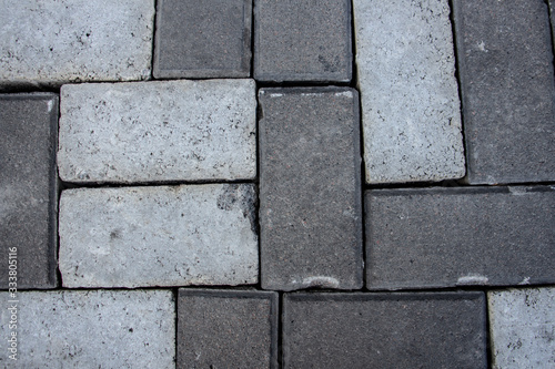 dark gray and light gray brick, frame on top
