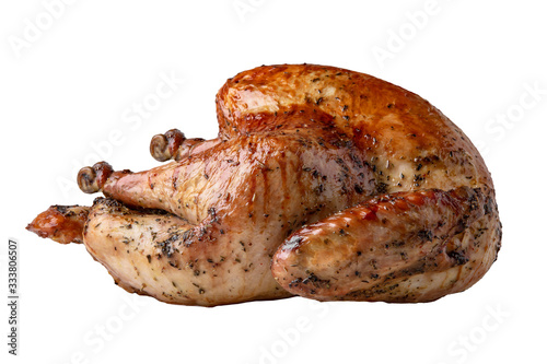 Organic whole young roast Turkey with a crispy crust. Isolated on a white background.