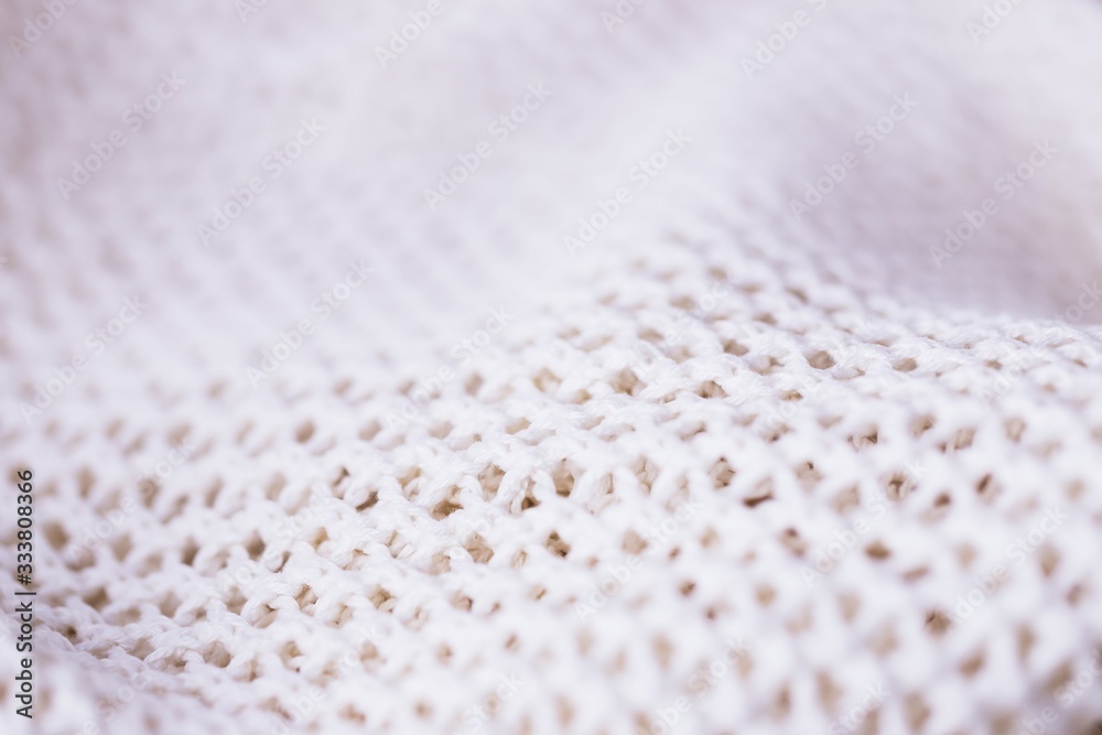 White fabric mesh textile background, knitting background texture White fabric mesh textile background, knitting background texture