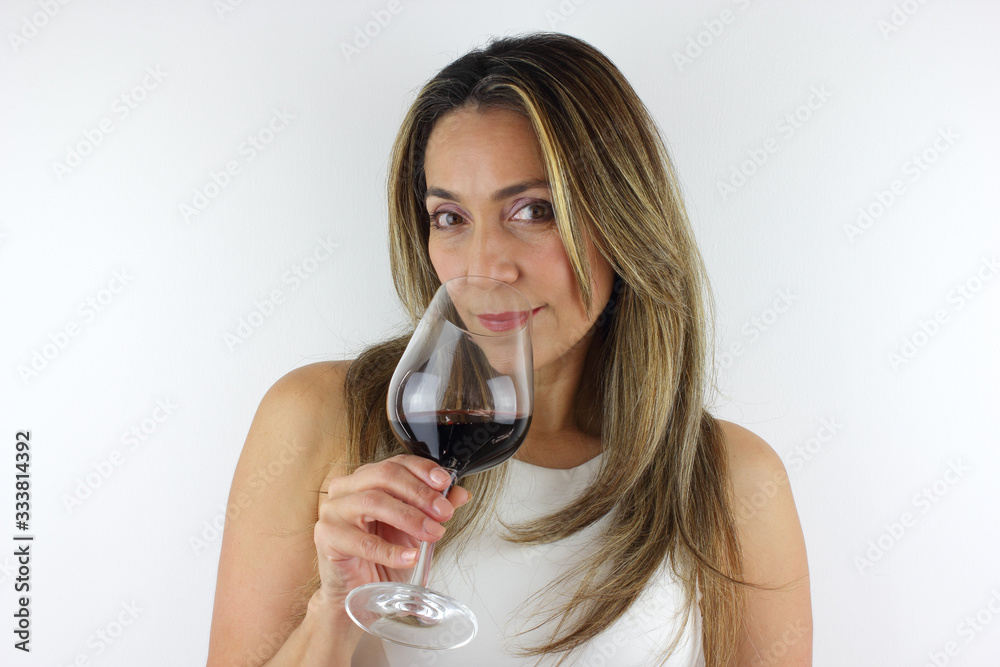 Beautiful Latin American Woman with a glass of red Wine Beautiful Latin American Woman with a glass of red Wine
