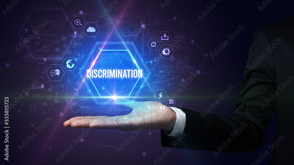 Man hand holding DISCRIMINATION inscription, social media concept Man hand holding DISCRIMINATION inscription, social media concept