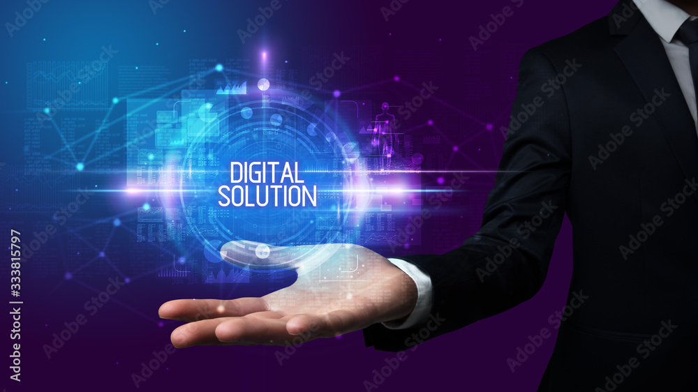 Fototapeta premium Man hand holding DIGITAL SOLUTION inscription, technology concept