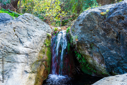 Small Waterfall in the gorge of Richtis at winter, Crete, Greece. photo