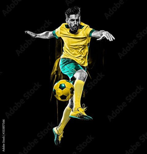 caucasian soccer player man isolated black background light painting