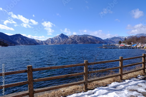winter landscape with chuzenji lake and mountains in Nikko