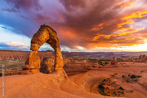 Sunset over Delicate Arch - Desert Arches National Park Landscape Picture Fotobehang