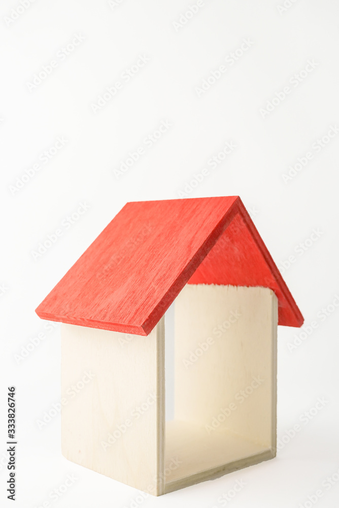 Wooden mini house on the white background Wooden mini house on the white background