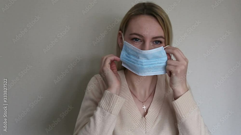 Coronavirus outbreak: An putting on a medical disposable mask to avoid contagious viruses. breathing, infect, bacteria, contaminate, hygiene, disposable, covid-19, protective, infection, health care, Coronavirus outbreak: An putting on a medical disposable mask to avoid contagious viruses. breathing, infect, bacteria, contaminate, hygiene, disposable, covid-19, protective, infection, health care,