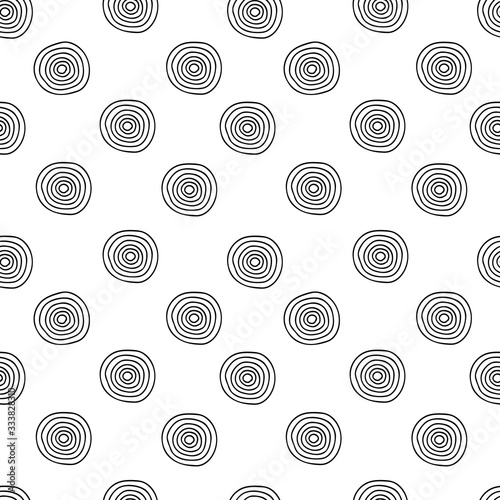 Vector seamless pattern of black hand-drawn circles isolated on a white background