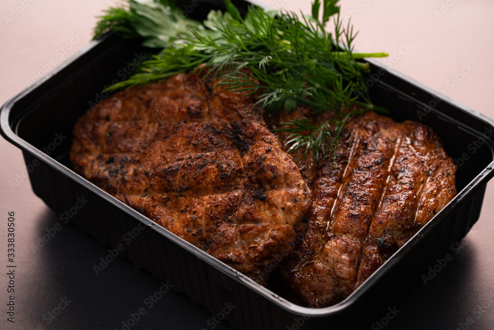 Tasty meat steak with dill high angle view Tasty meat steak with dill high angle view