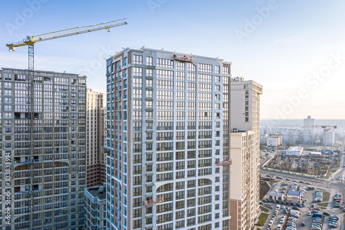 aerial view of city construction site with crane and buildings. development of residential district