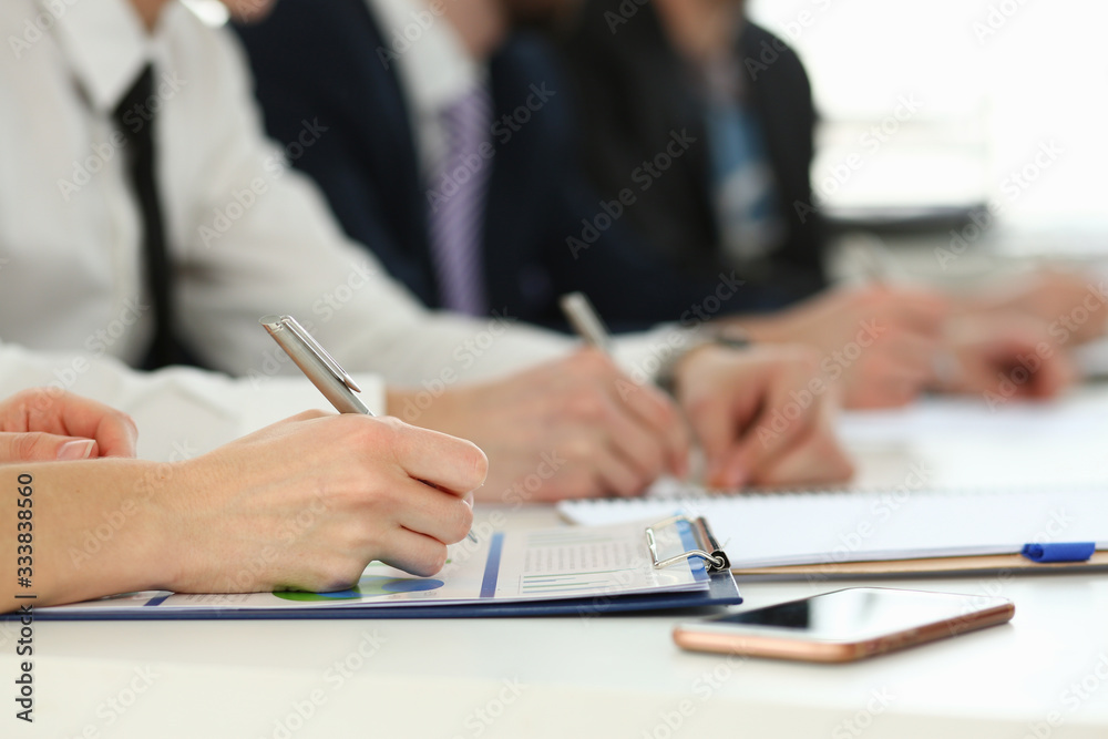 Fototapeta premium Group of people clap their arm in row during seminar closeup. Great news brief achievement win deal good job happy birthday employee introduce party positive welcome effective speech concept