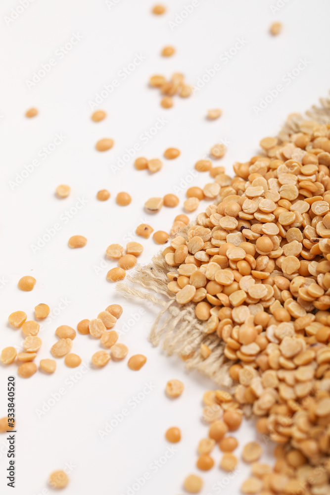 pigeon pea also known as toor dal on white background