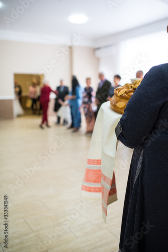 wedding and this is one of the traditions, to meet the bride and groom with a loaf and salt