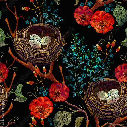 Embroidery. Wild roses, meadows herbs and and bird nest with eggs. Seamless pattern. Happy Easter. Spring garden art. Template for design of clothes, tapestry