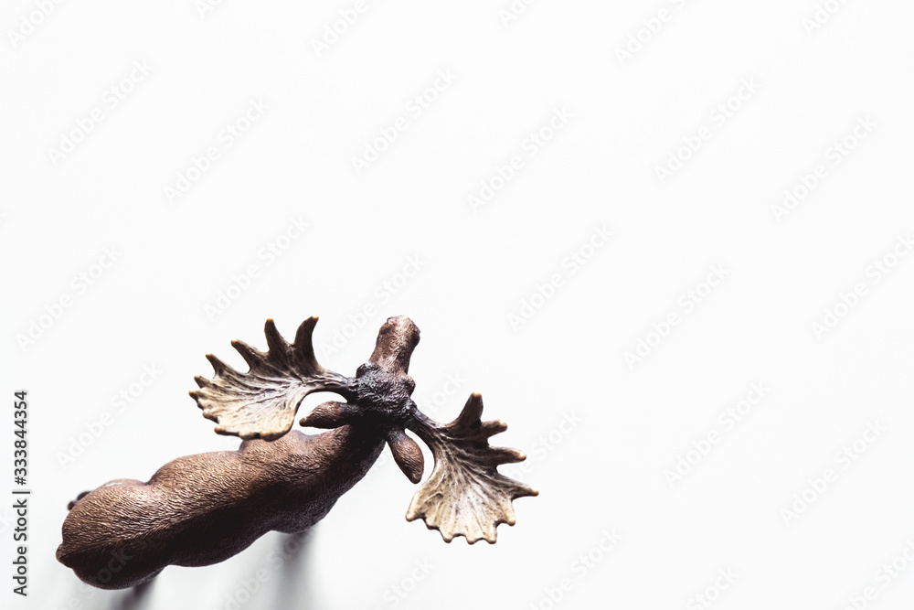 Moose model isolated on white background, animal toys Moose model isolated on white background, animal toys