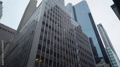 Wallpaper Mural Skyscrapers and office buildings in New York City lower Manhattan's Financial Districit. Low angle view. Multiple buildings from the street looking up. Torontodigital.ca