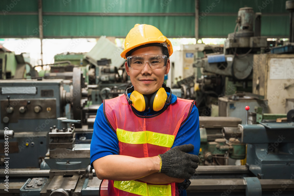 Asian Industrial workers are working on projects in large industrial plants with many devices. Asian Industrial workers are working on projects in large industrial plants with many devices.