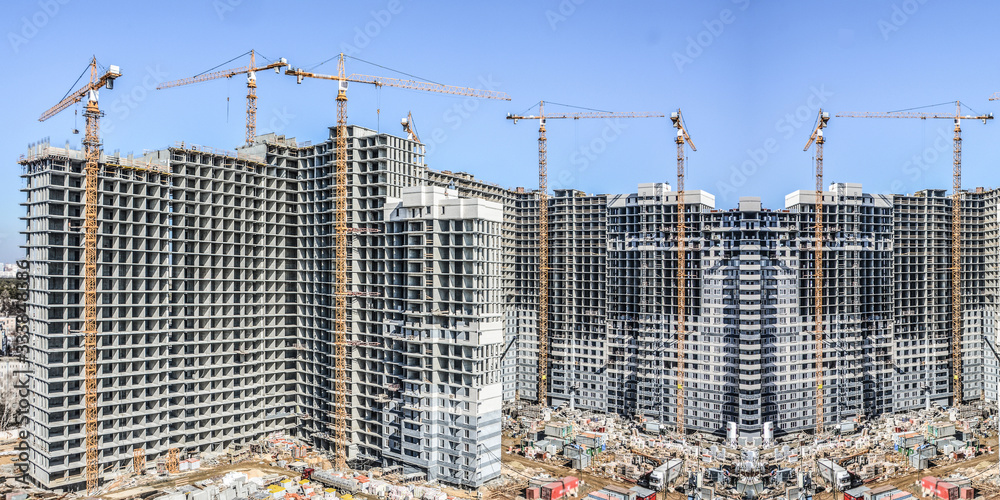	Construction of new residential buildings against the sky . The concept of the construction business .