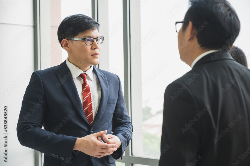 Asian business people team analyzing statistics financial. Team of businesspeople Meeting Conference Discussion Corporate Concept in office. Asian business people team analyzing statistics financial. Team of businesspeople Meeting Conference Discussion Corporate Concept in office.