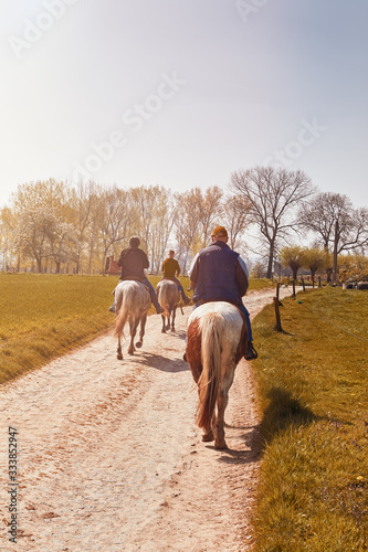 Horse riders on the country side during Autumn