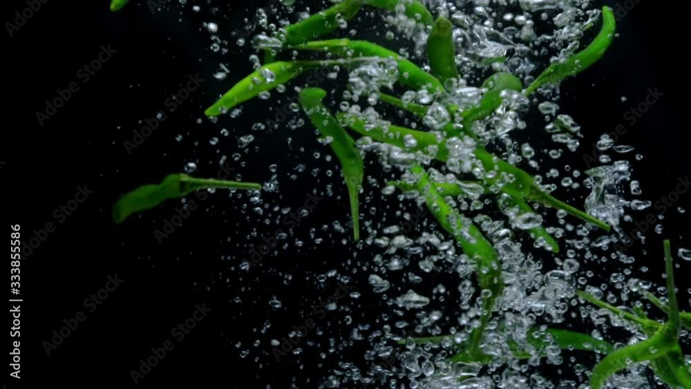 chili drop in water slow motion chili drop in water slow motion