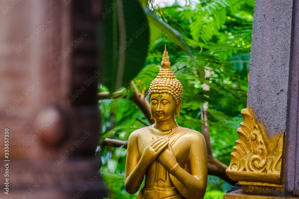 Buddha and bells in Golden Mount temple in Bangkok, Thailand Buddha and bells in Golden Mount temple in Bangkok, Thailand