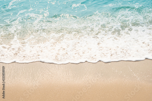 Fototapeta Naklejka Na Ścianę i Meble -  wave of blue ocean on sandy beach. texture Background.