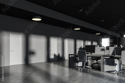 Dark gray open space office with doors
