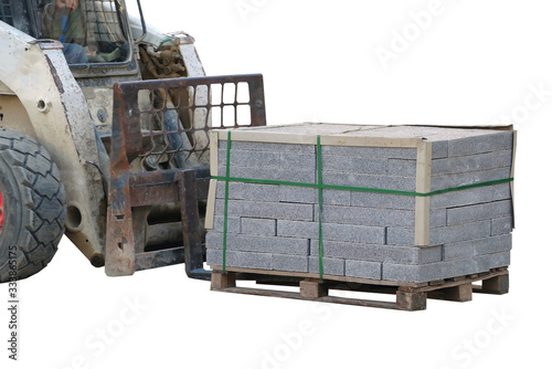 Obraz na płótnie transportation the pallet with a stack of concrete curbstone