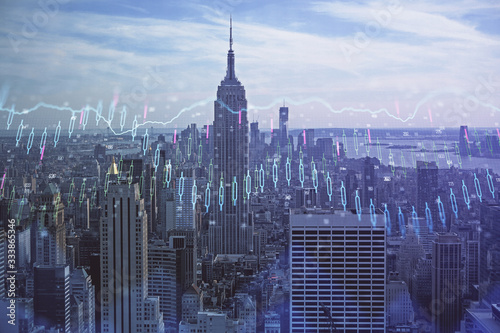 Forex graph on city view with skyscrapers background double exposure. Financial analysis concept.