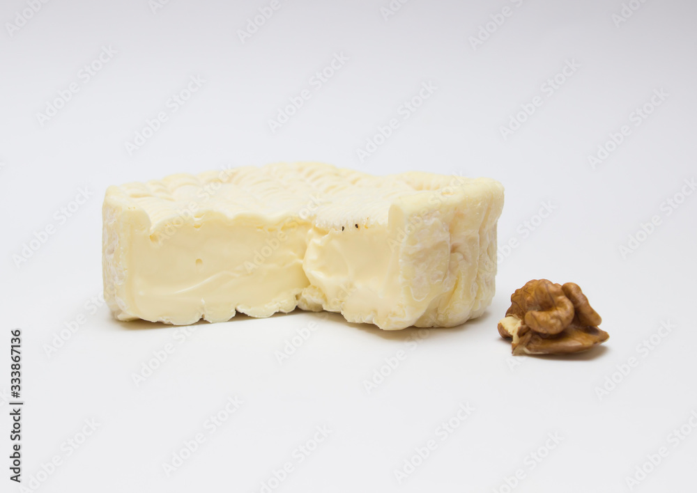 French-veined cheese from the Normandy region on a white background close