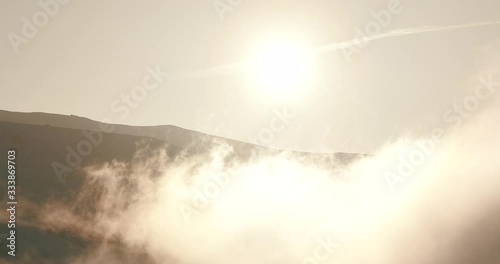 Timelapse in Sierra Nevada, Granada, Spain. I love the way the clouds move in this timelapse. Video made with Canon XF400 and Manfroto tripod. photo