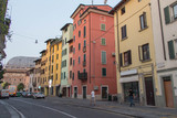 Colored houses in San Faustino street in Brescia, Lombardy, Italy.