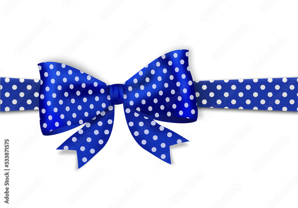Decorative blue bow and ribbon with white dots Decorative blue bow and ribbon with white dots